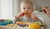 Toddler Holds Food in Mouth and Won't Swallow: Causes and Solutions